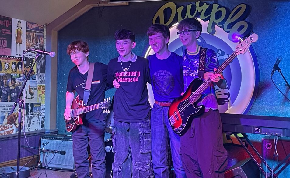 The Status rock The Purple Turtle