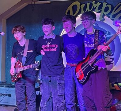 The Status rock The Purple Turtle